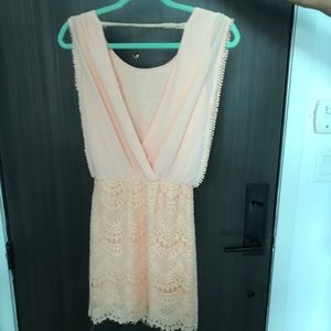 Brand new. Light peach/pink dress. Size S